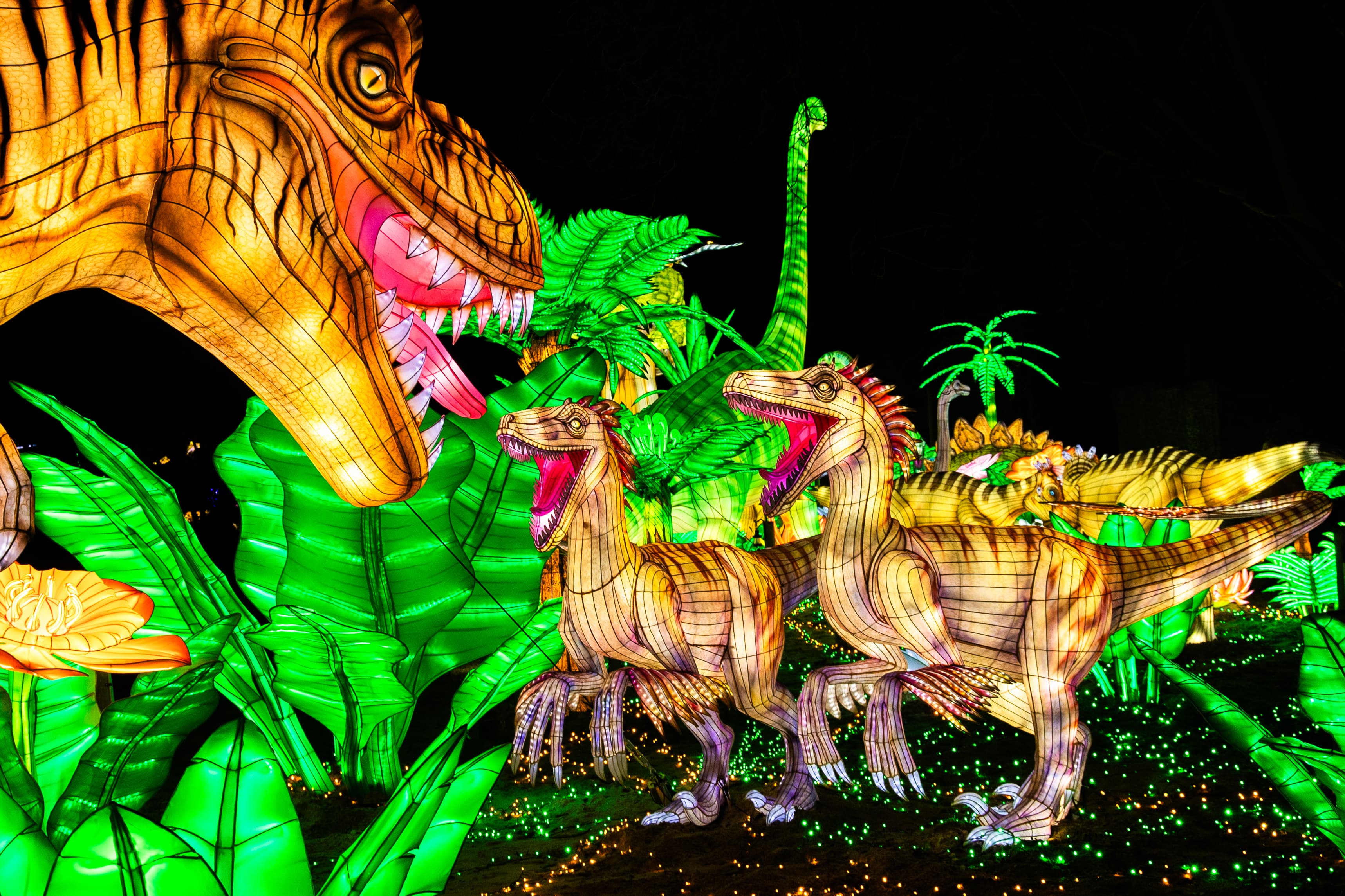 leuchtende dinosaurier und grüne blätter