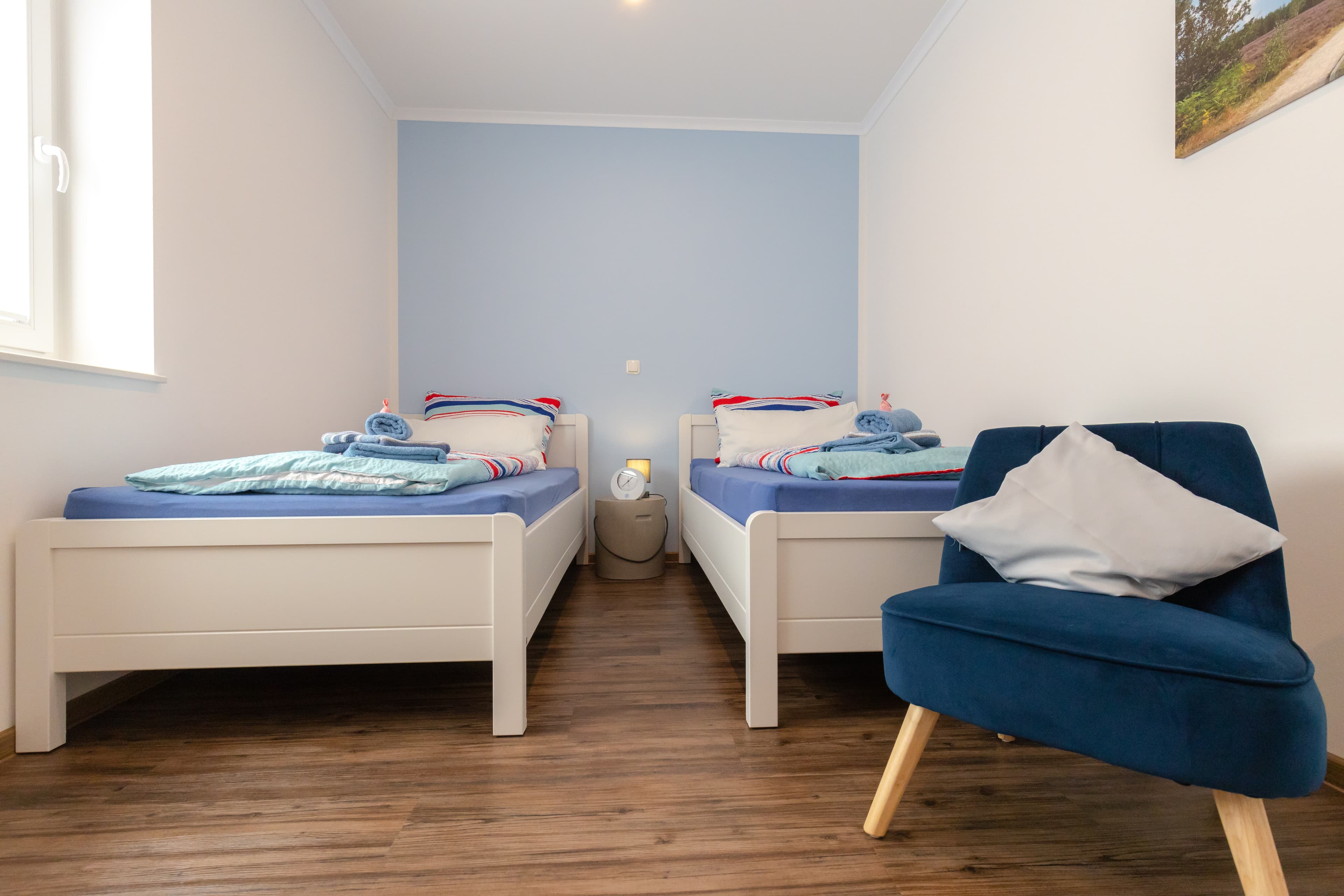 Schlafzimmer mit Einzelbetten im Ferienhaus Südheide in Hermannsburg