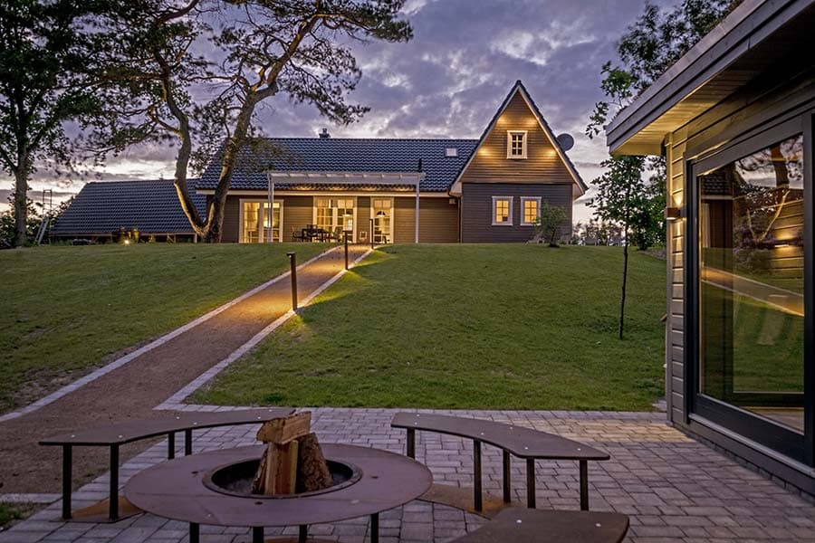 Blick von der Sauna auf das Ferienhaus