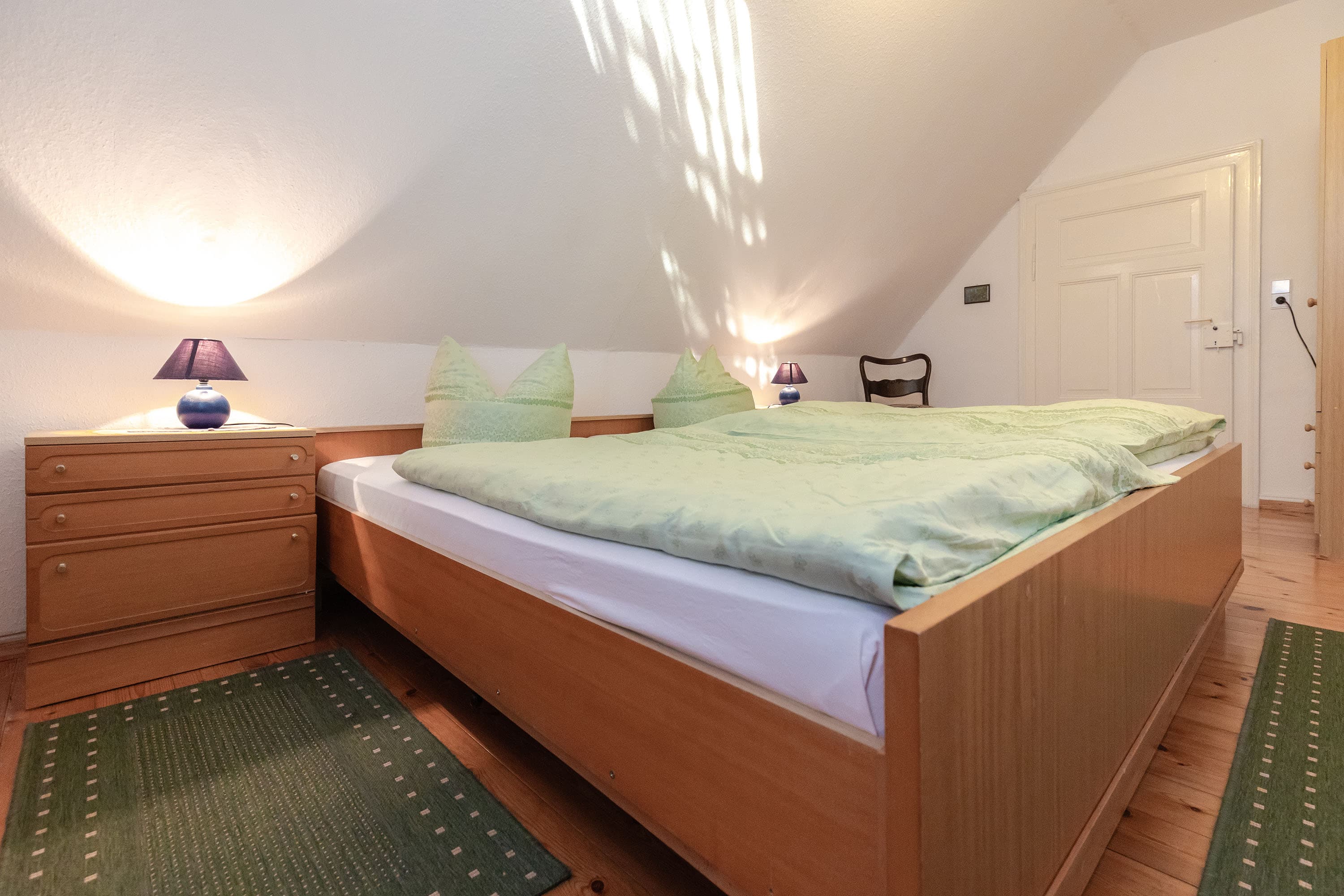 Doppelbett Wohnung 1 Gasthaus Columbus