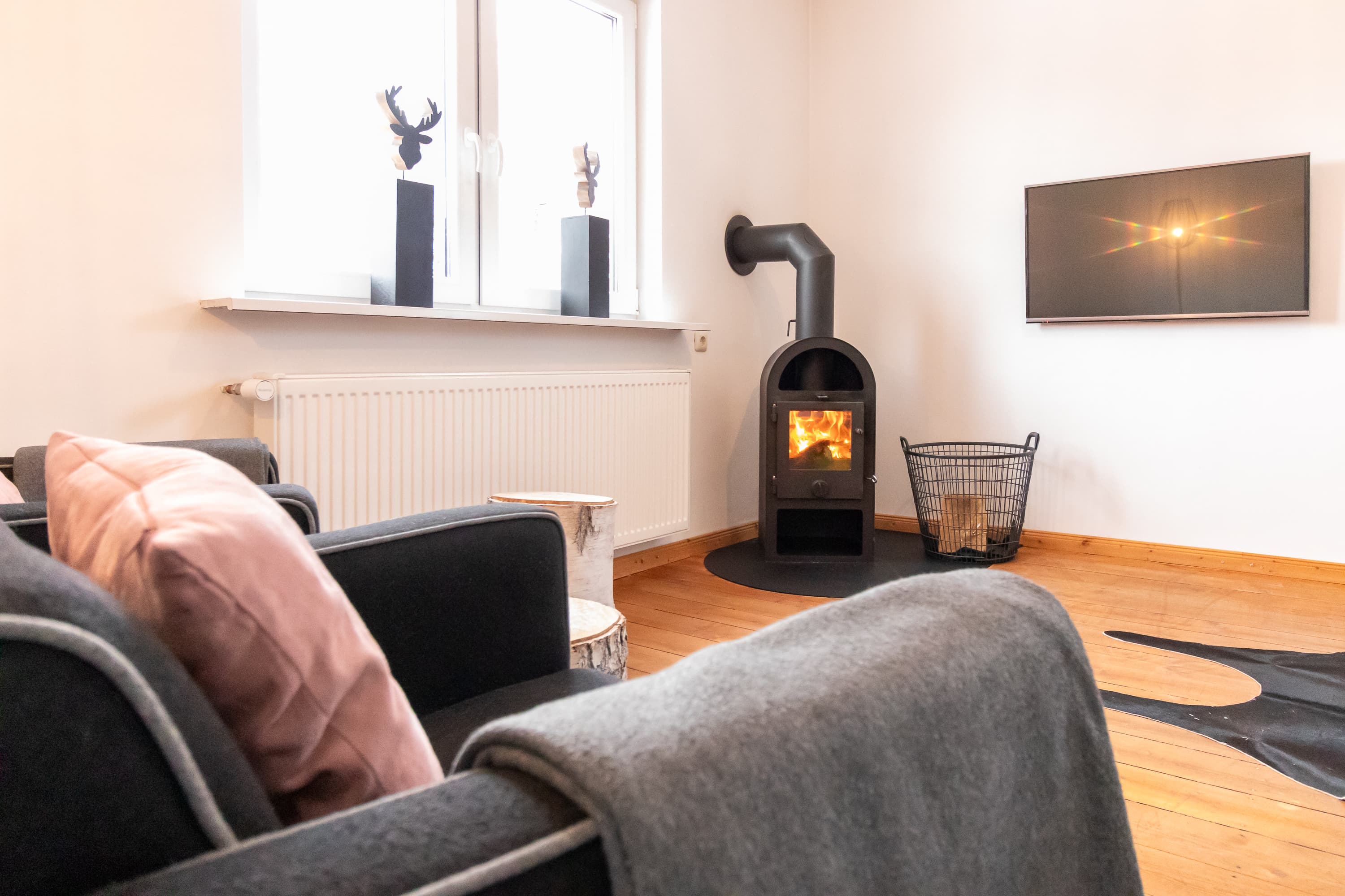 Ferienhaus " Dat Huuske" | Wohnzimmer mit Kamin