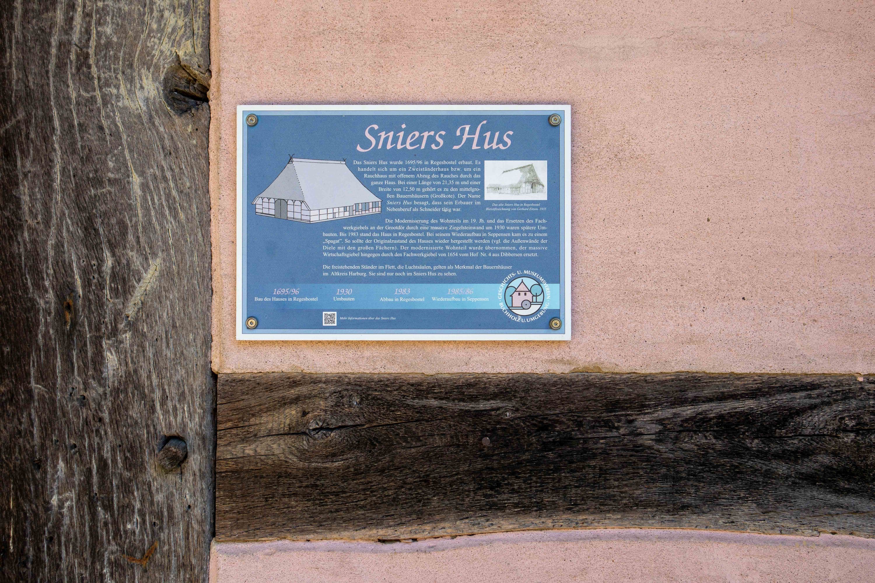 Schild am Sniershus im Museumsdorf Seppensen