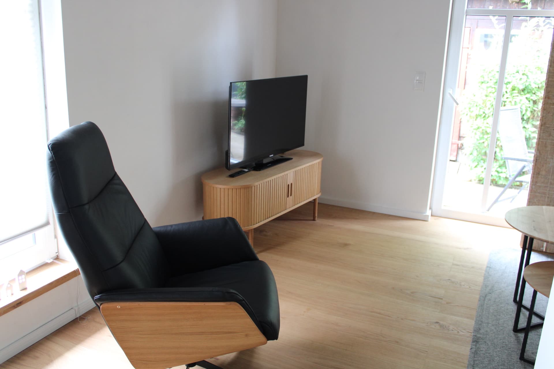 Fernsehecke mit Relaxsessel in der Ferienwohnung Meta`s Hof Lachendorf