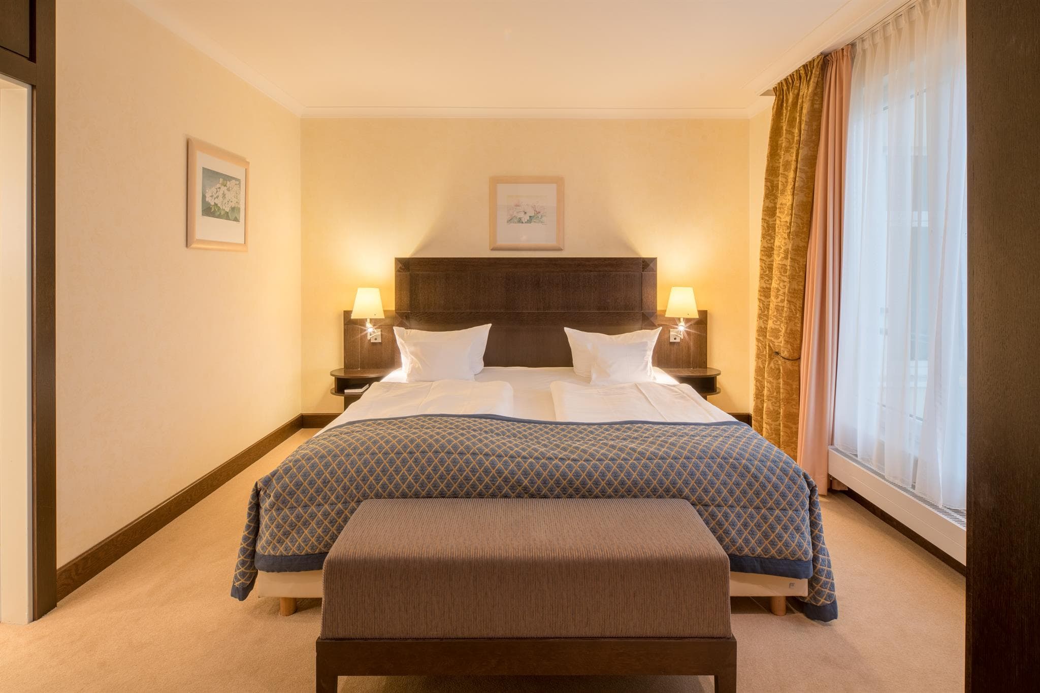 Doppelbett im Hotel Castanea