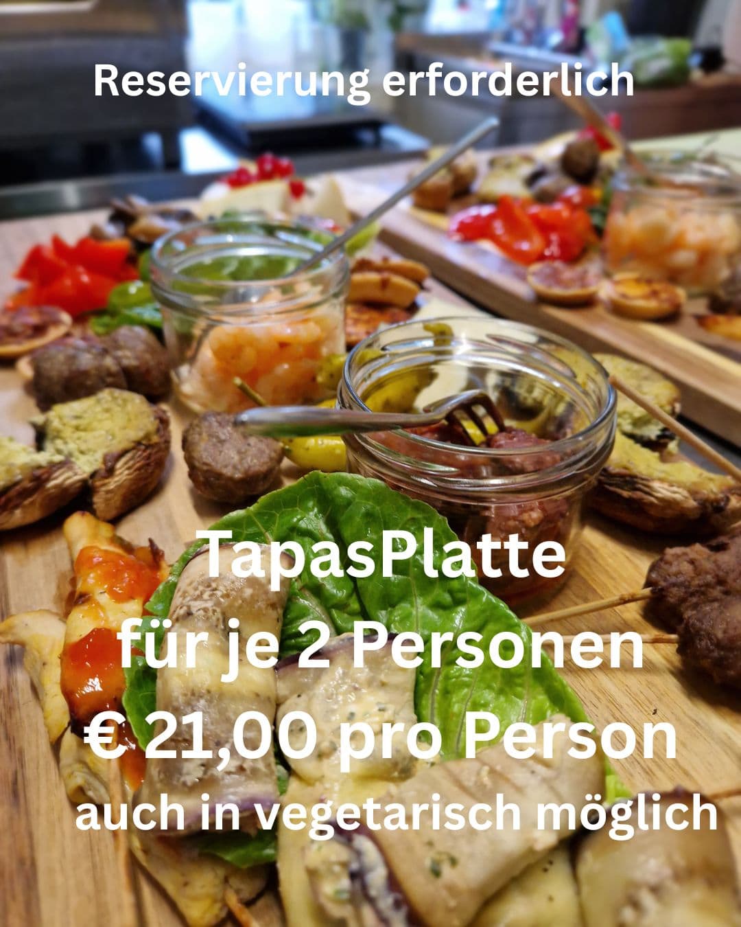 Tapasplatte mit Antipasti; Reservierung erforderlich, 21 € pro Person, vegetarisch möglich
