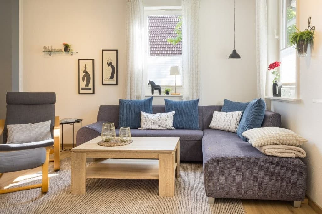 Wohnzimmer mit Sofa Ferienwohnung Constabel
