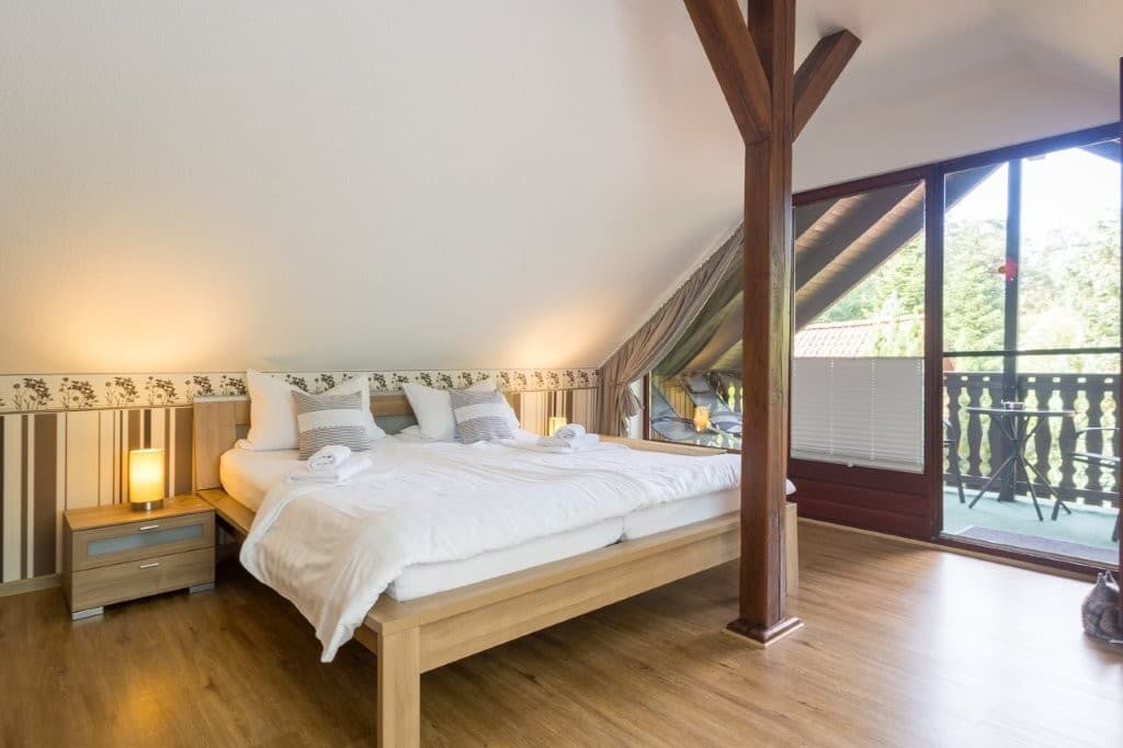 Ferienwohnung Constabel Schlafzimmer 1 oben mit Balkon in Wieckenberg