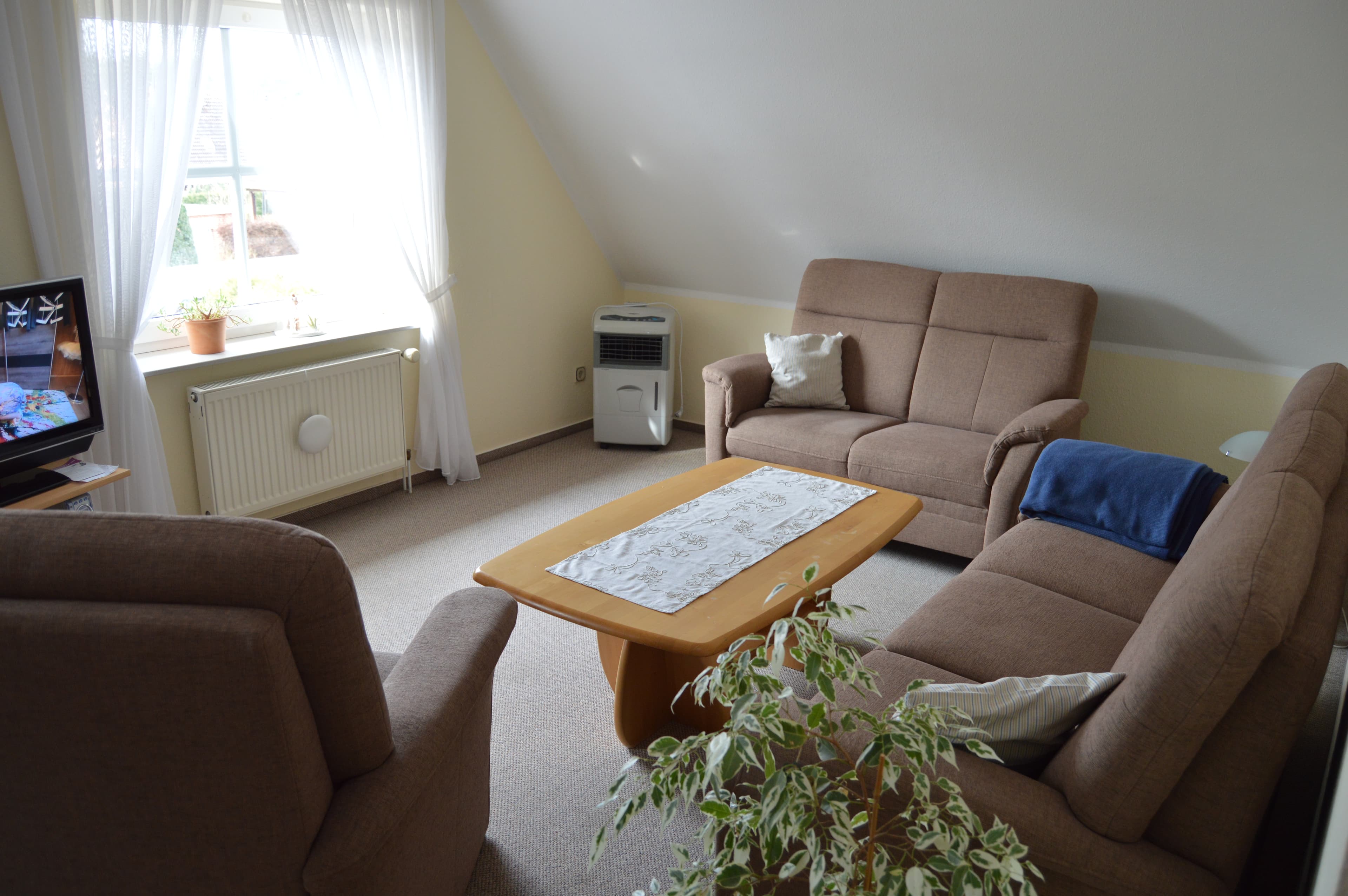 Das Wohnzimmer in der Ferienwohnung Heidegeist in Neuenkirchen