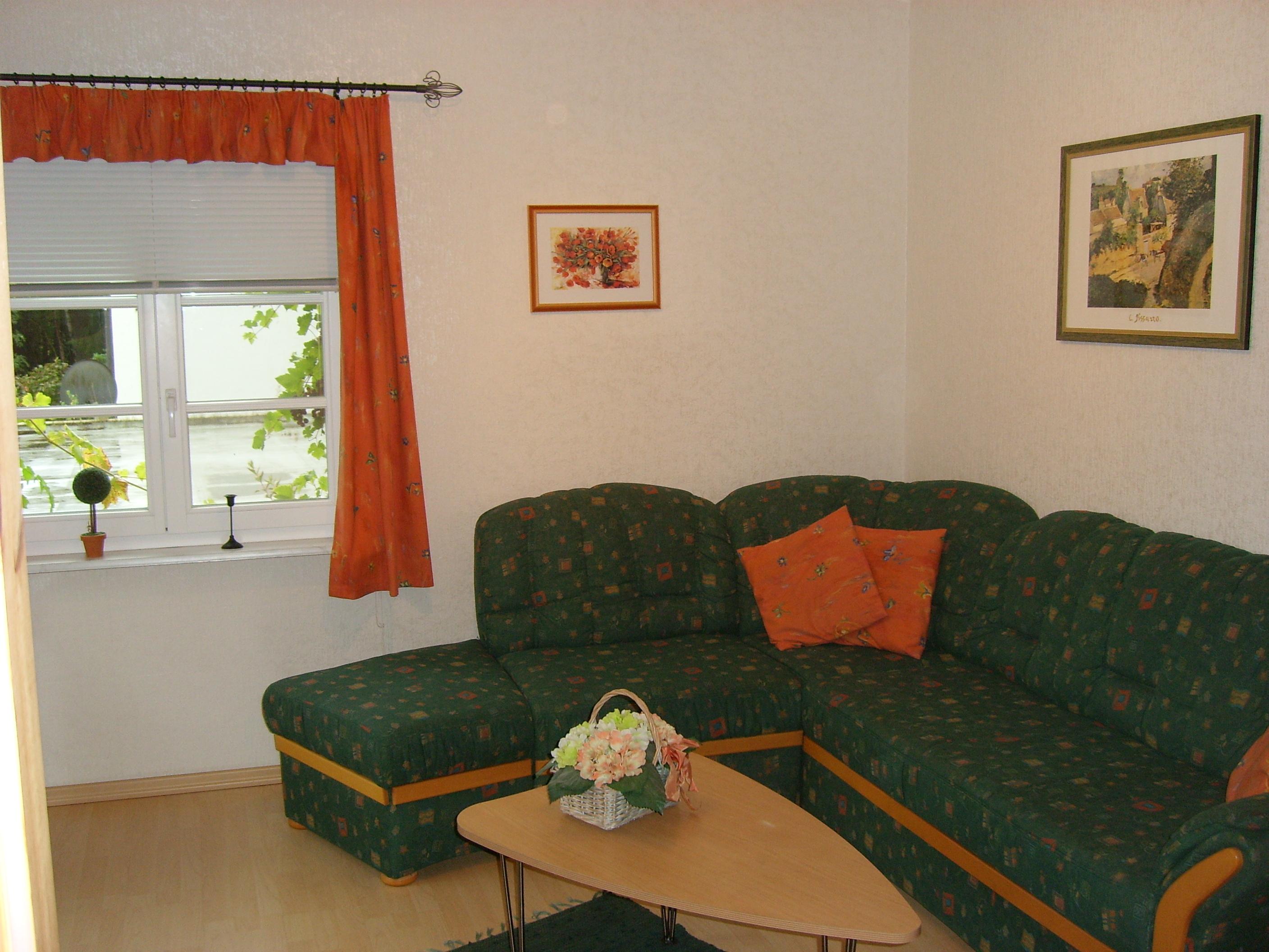 Wohnzimmer mit Sitzecke Ferienhaus Auetal