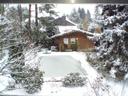Garten im Winter Ferienhaus "Unter den Birken"