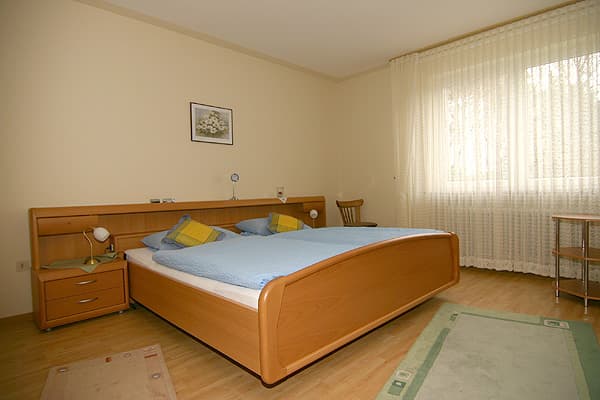 Schlafzimmer Ferienwohnung Pension am Hardausee