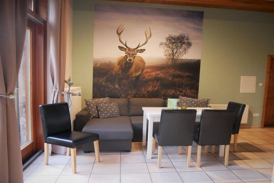 Wohnzimmer der Ferienwohnung Hirschgrund auf dem Ferienhof Holste