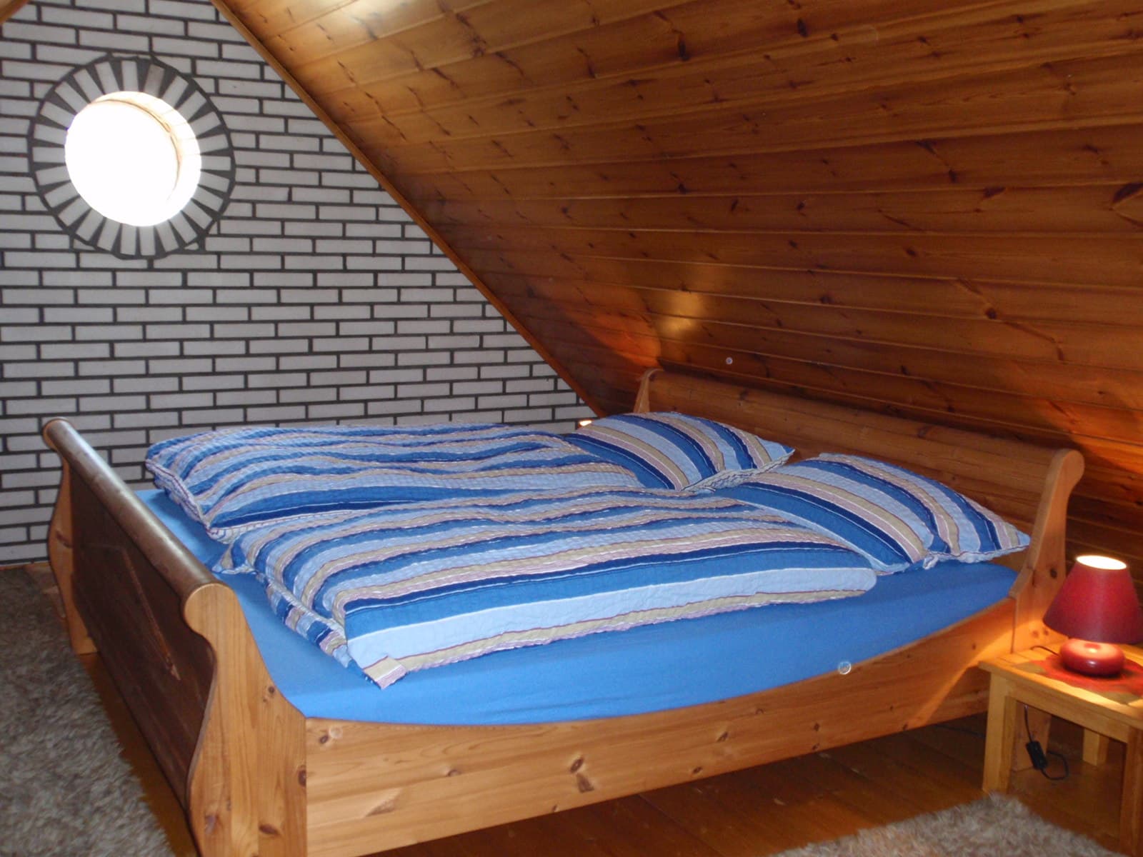 Schlafzimmer im Spitzboden (mit Balkon) Ferienhof Wiechers - Ferienhaus