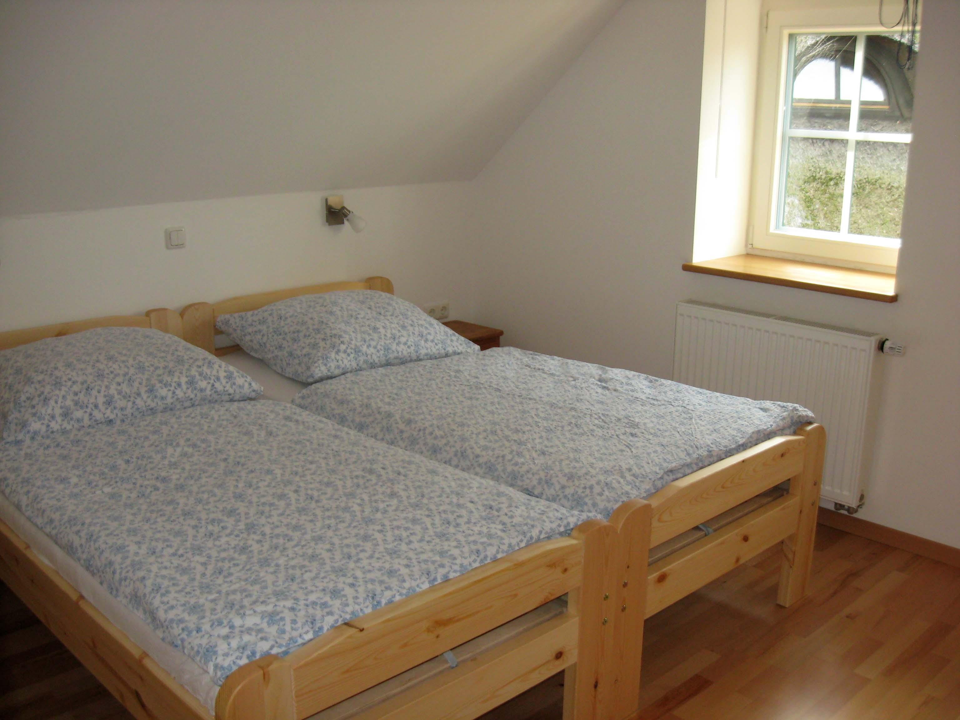 Schlafzimmer mit Doppelbett Ferienwohnung Speicherhaus