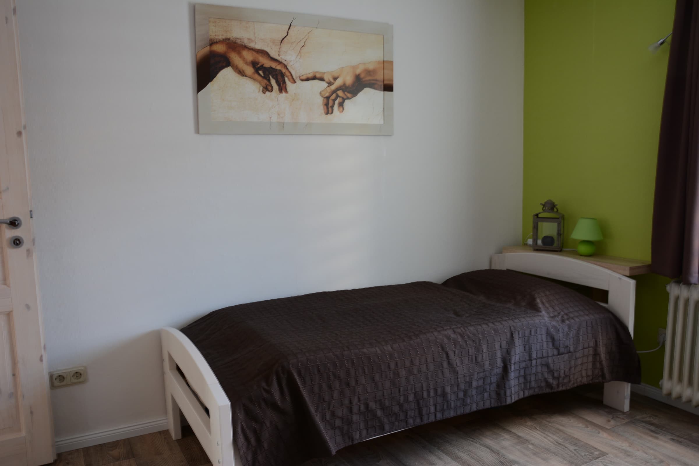 Einzelbett / Schlafzimmer 1 Ferienwohnung Behrens