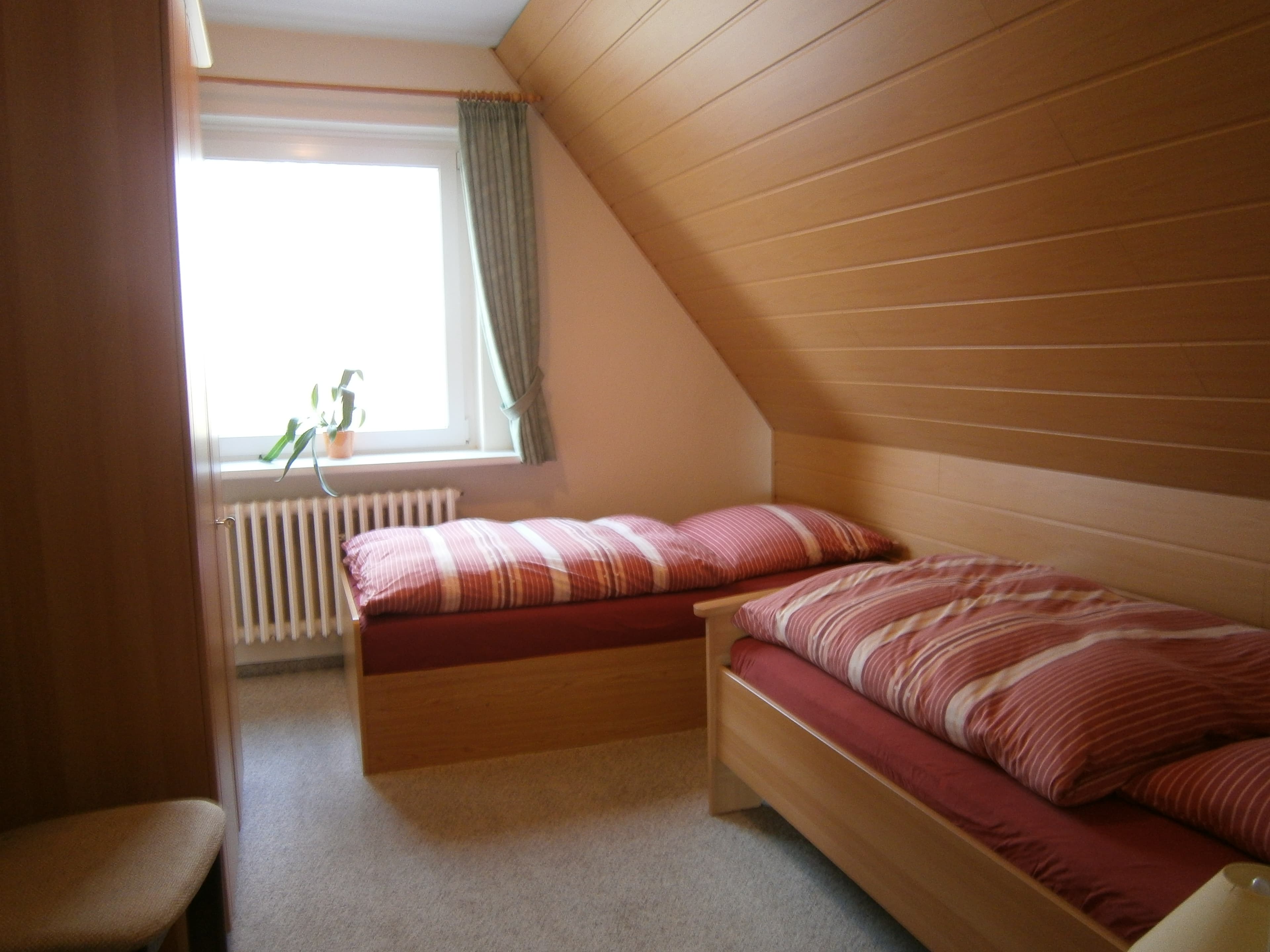 Schlafzimmer in den Ferienwohnungen Thiele in Hollenstedt