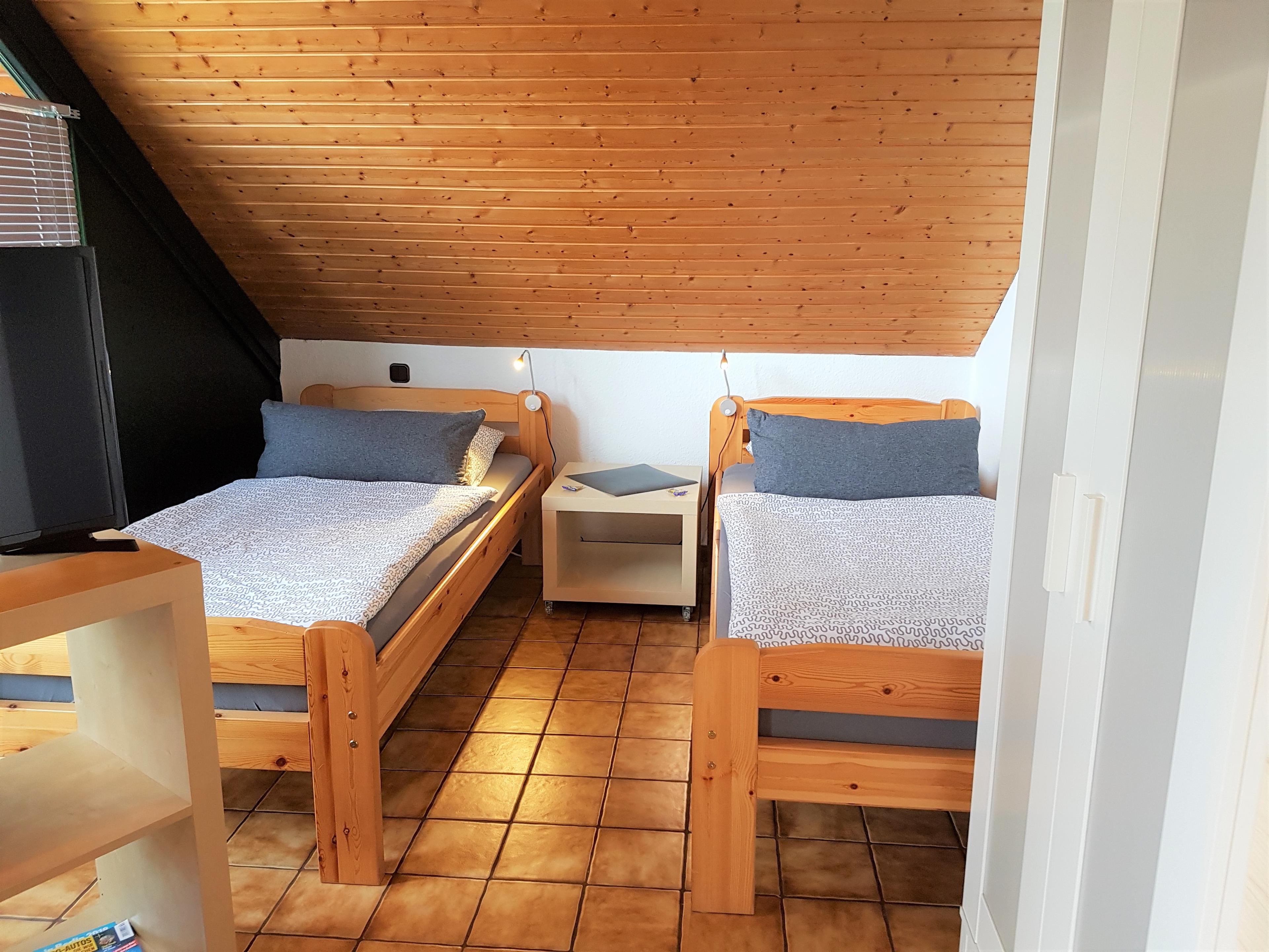 Schlafbereich in dem Gartenblick Appartement im Ferienquartier Hamburg im Seevetal
