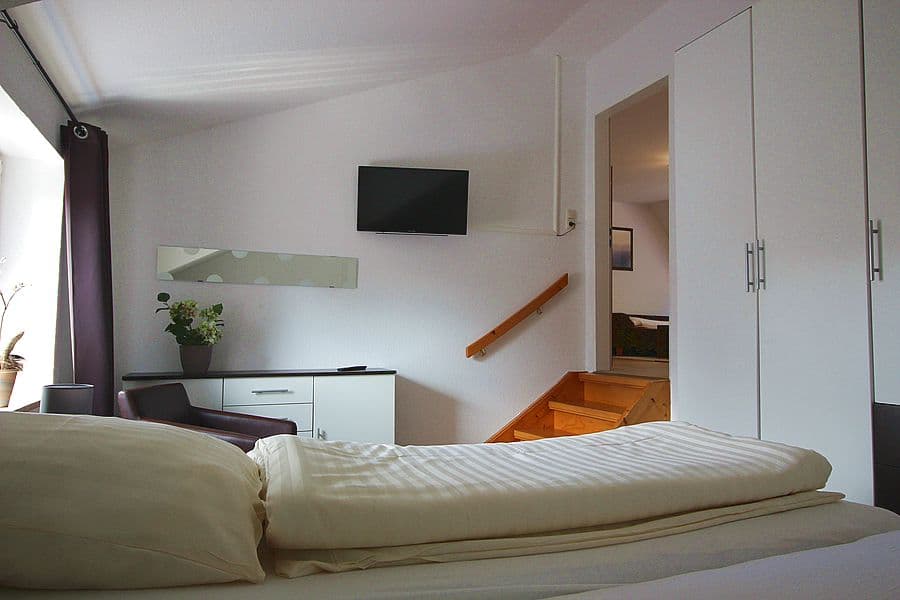 Schlafzimmer in den Ferienwohnungen Peters in Müden