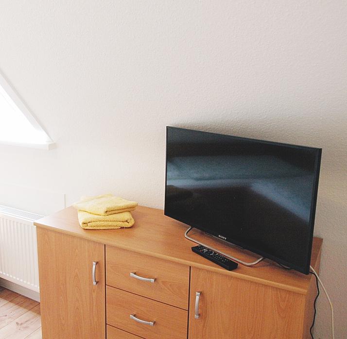 Ferienwohnung Harms Schlafzimmer mit TV